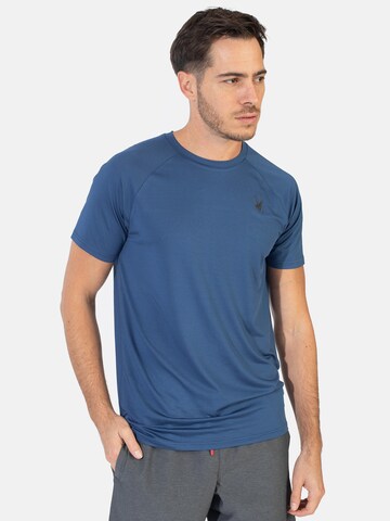 T-Shirt fonctionnel Spyder en bleu : devant