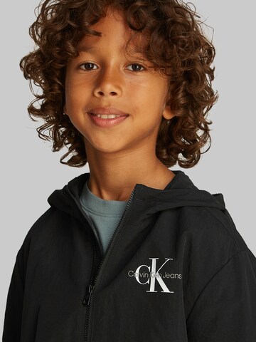 Calvin Klein Jeans Between-season jacket 'Essential' in Black