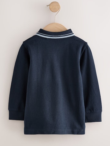 Next Shirt in Blau: Vorderseite