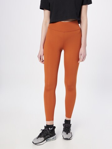 Skinny Pantalon de sport 'One' NIKE en orange : devant