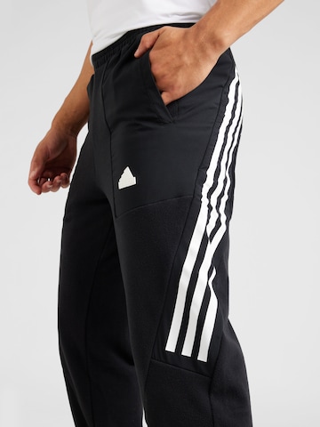 ADIDAS SPORTSWEAR Дънки Tapered Leg Спортен панталон 'Future Icons' в черно