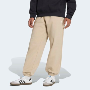 ADIDAS ORIGINALS Tapered Pants in Beige: front