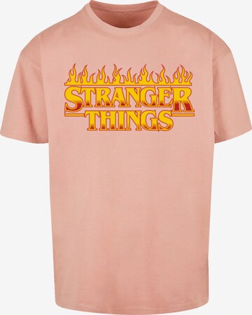 F4NT4STIC Shirt 'Stranger Things Netflix TV Series'' in Oranje: voorkant