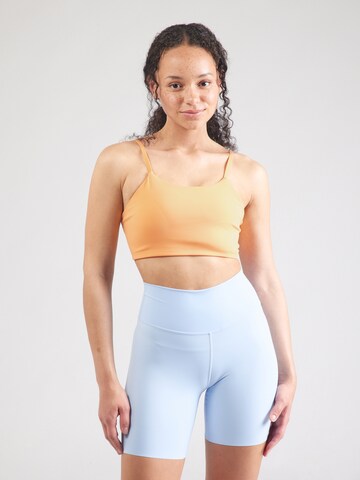 Bustino Reggiseno sportivo 'Bloom' di Athlecia in arancione: frontale