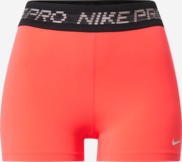 NIKE Skinny Sportbroek in Rood: voorkant