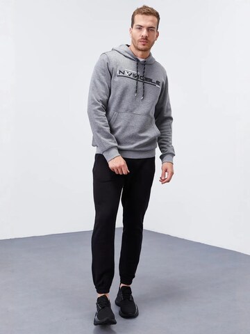 Sweat-shirt Tommy Life en gris