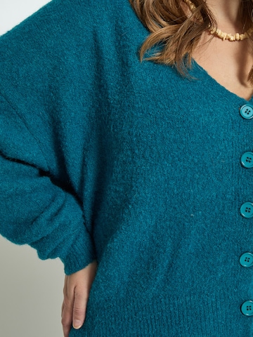 Cardigan 'Pearl' Peppercorn en bleu