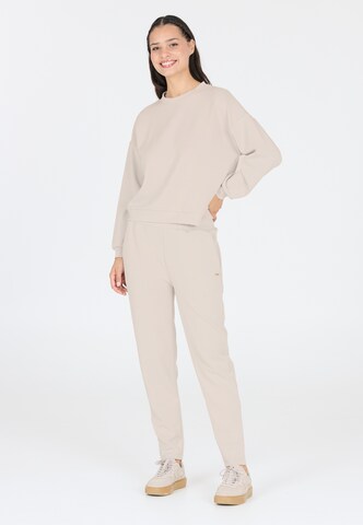 Athlecia Tapered Sportbroek 'Jillnana' in Beige