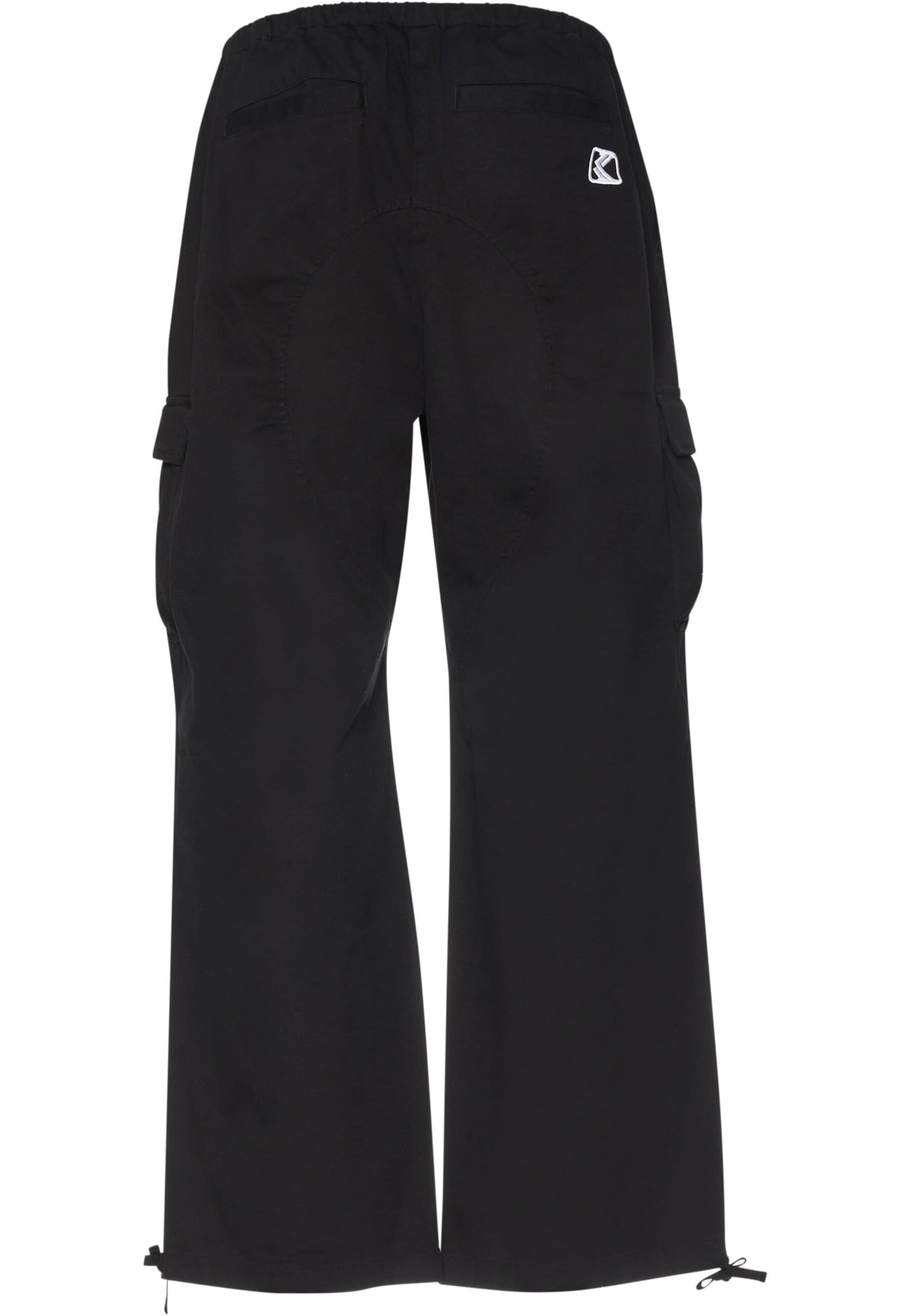 melns Karl Kani Vaļīgs piegriezums Bikses