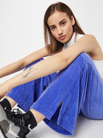 Nike Sportswear Široke hlačnice Hlače | vijolična barva