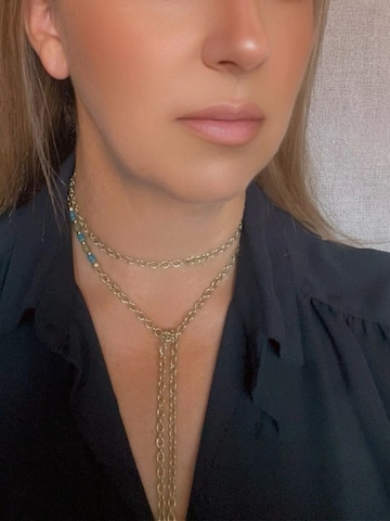 Gloria Mago - Cadena 'Long multi-position necklace with gold-plated green chain and crystal' en oro