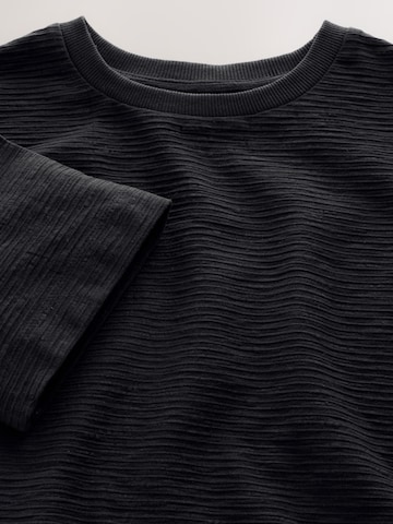 Next T-shirt i svart