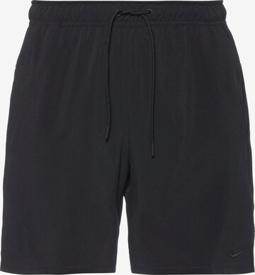 Regular Pantalon de sport 'Unlimited' NIKE en noir : devant