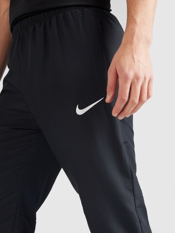 Effilé Pantalon de sport 'Academy' NIKE en noir