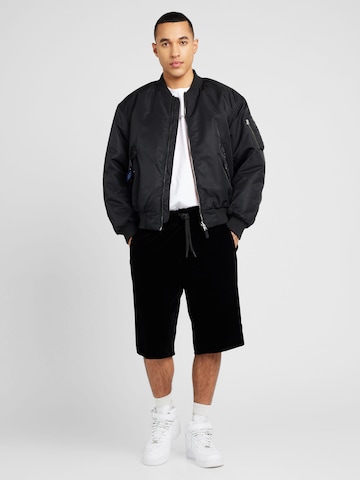 Versace Jeans Couture Loosefit Shorts in Schwarz