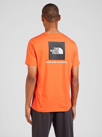 THE NORTH FACE T-shirt 'REDBOX' i orange: framsida
