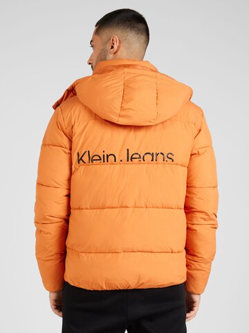 Calvin Klein Jeans Between-Season Jacket 'Essential' in Orange