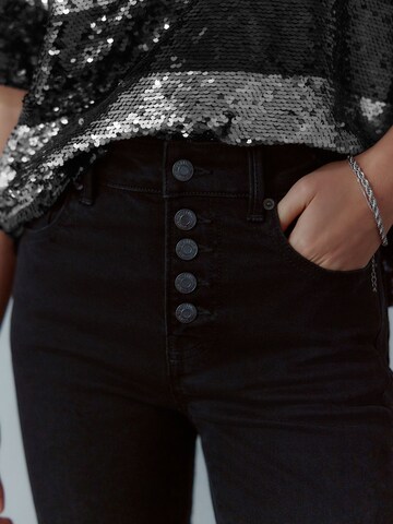 Skinny Jeans de la Next pe negru