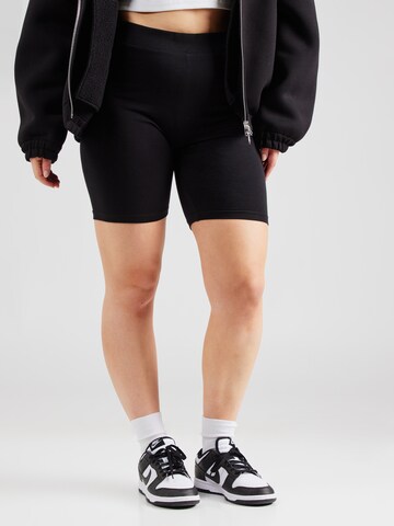 ONLY Carmakoma Skinny Leggingsit 'Time' värissä musta: etupuoli