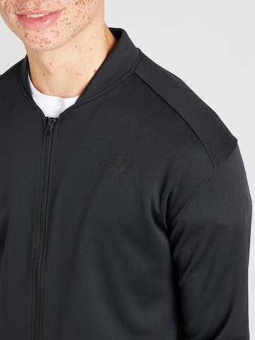 new balance Športna jakna 'Tenacity' | črna barva