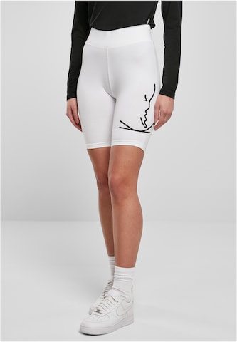 Karl Kani Skinny Leggings in White: front