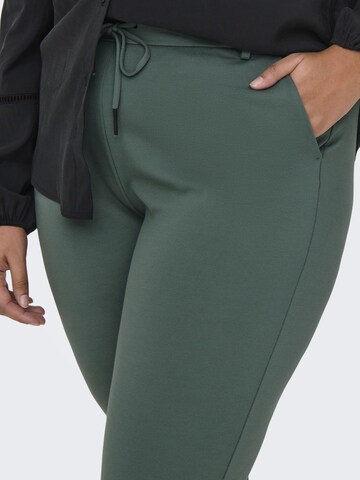 Slimfit Pantaloni 'Goldtrash Classic' di ONLY Carmakoma in verde