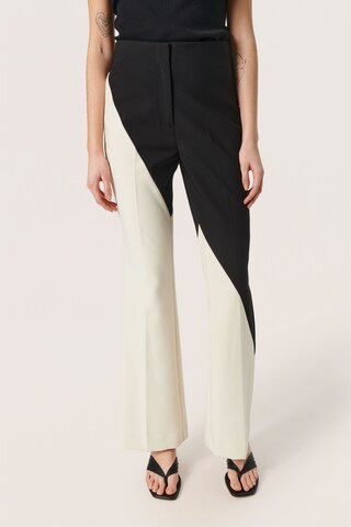 SOAKED IN LUXURY Flared Pants 'Corinne' in Beige: front