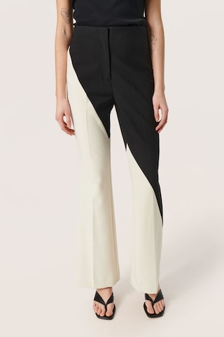 SOAKED IN LUXURY Flared Pants 'Corinne' in Beige: front