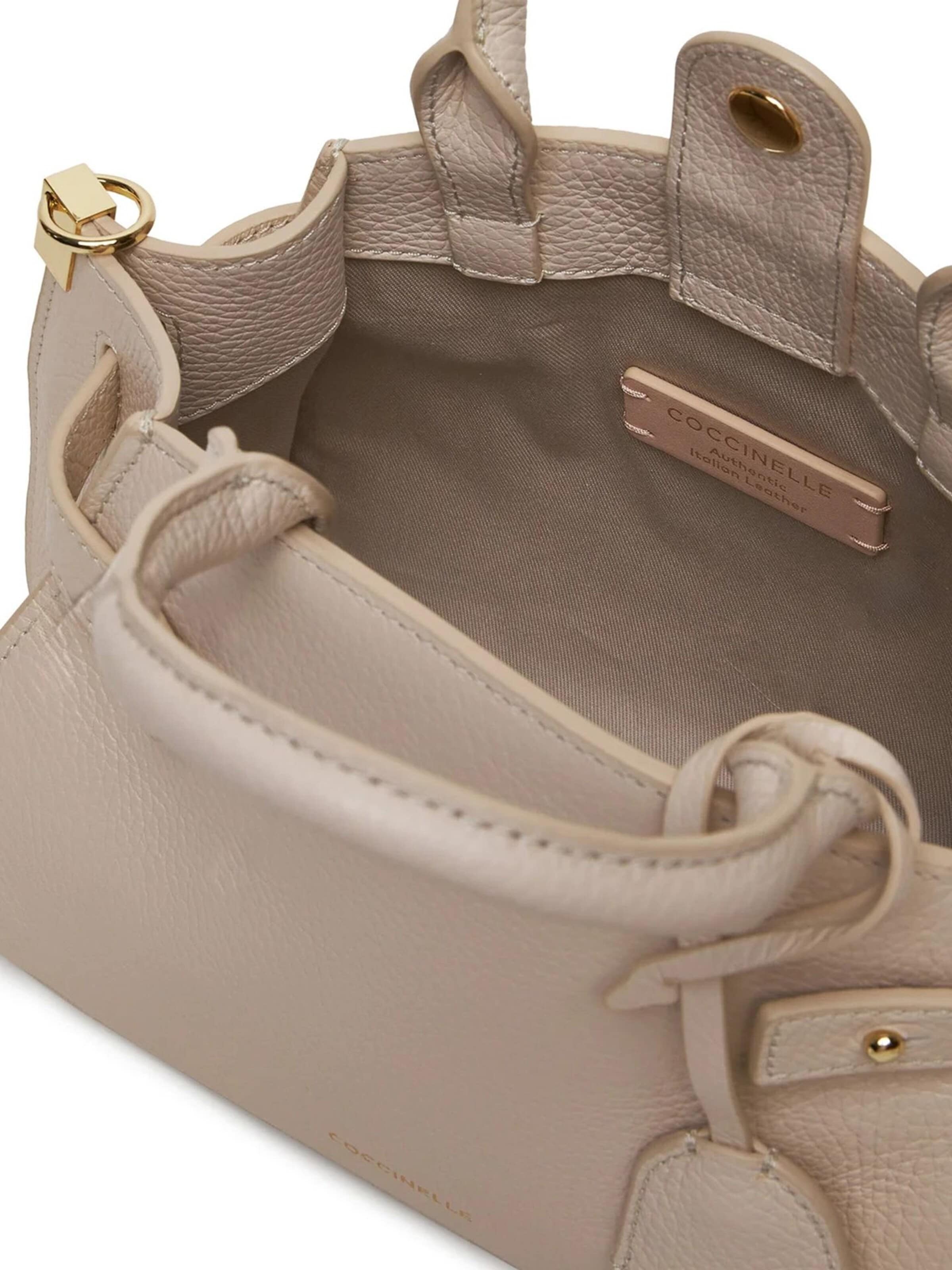 Coccinelle Handbag 'Kliche' in Beige