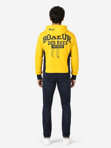 Boxeur des Rues - Sudadera 'Herren Hoodie Fitted Boxeur des Rues mit Reißverschluss und Kapuze, Gelb mit Marineblau, Baumwolle' en amarillo