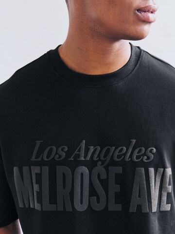 T-Shirt Next en noir
