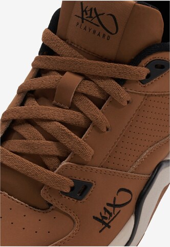 Sneaker bassa di K1X in marrone