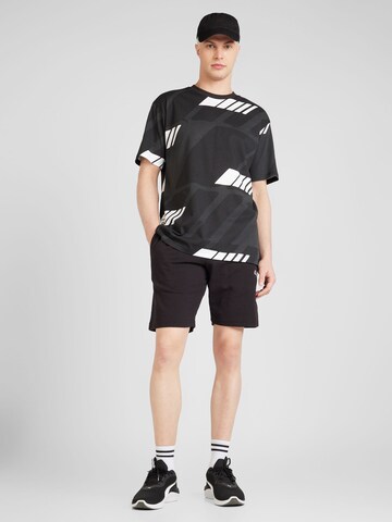 PUMA T-shirt 'AMG Statement' i svart