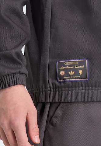 Sweat-shirt 'Manchester United Terrace Icons' ADIDAS ORIGINALS en noir