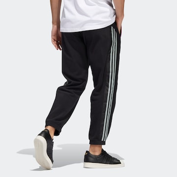 ADIDAS ORIGINALS regular Παντελόνι 'Polar Fleece' σε μαύρο