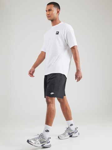 Nike Sportswear Loosefit Byxa 'CLUB' i svart