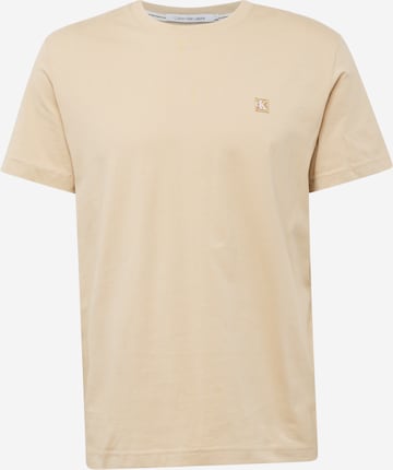 Calvin Klein Jeans T-shirt i beige: framsida