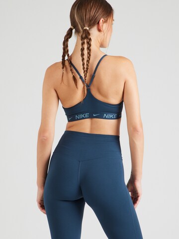 NIKE Korzetová Sportovní podprsenka 'INDY' – modrá