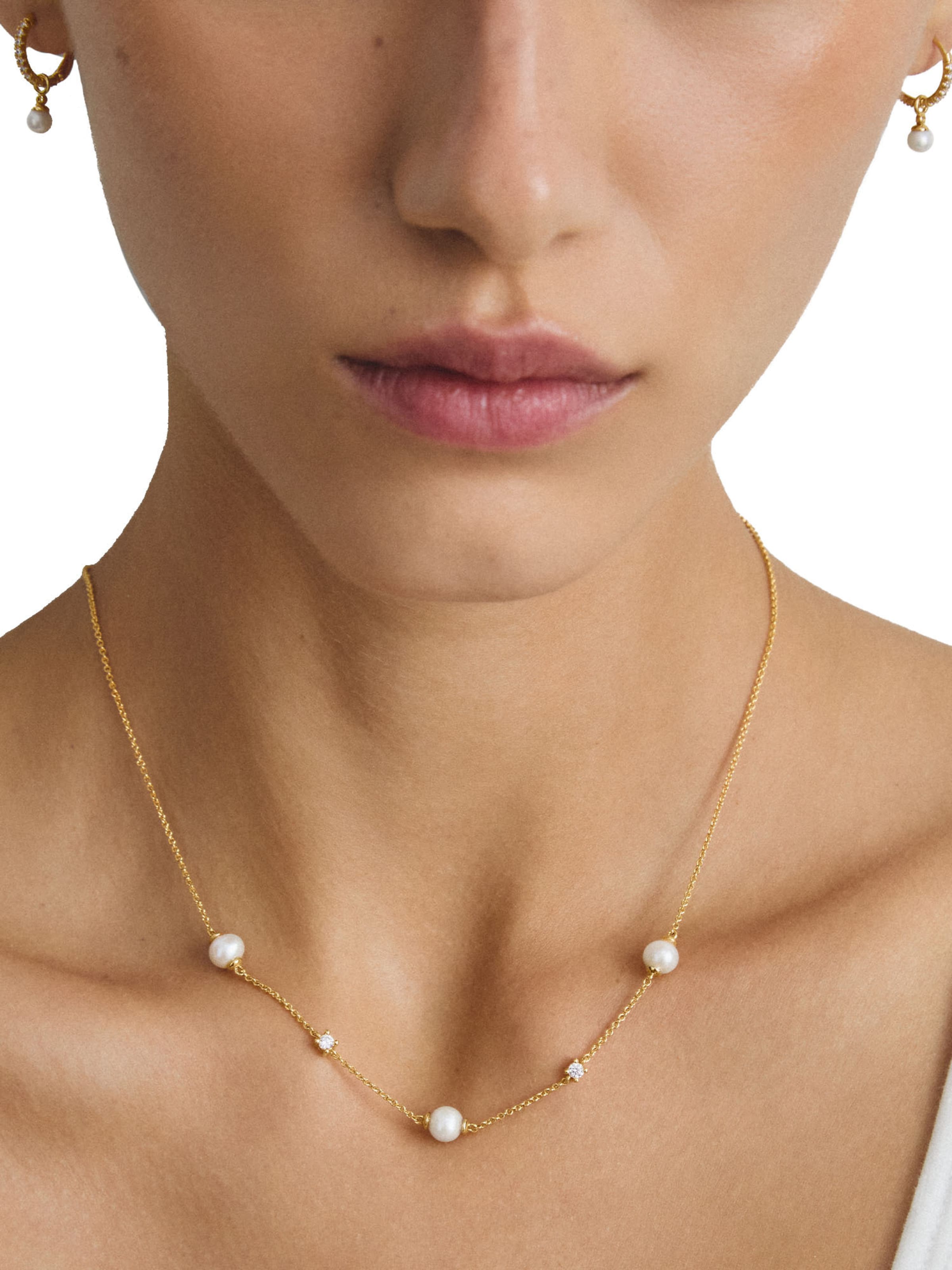 Thomas Sabo Kette mit Perlen und weißem Zirkonia in Gold: Vorderseite
