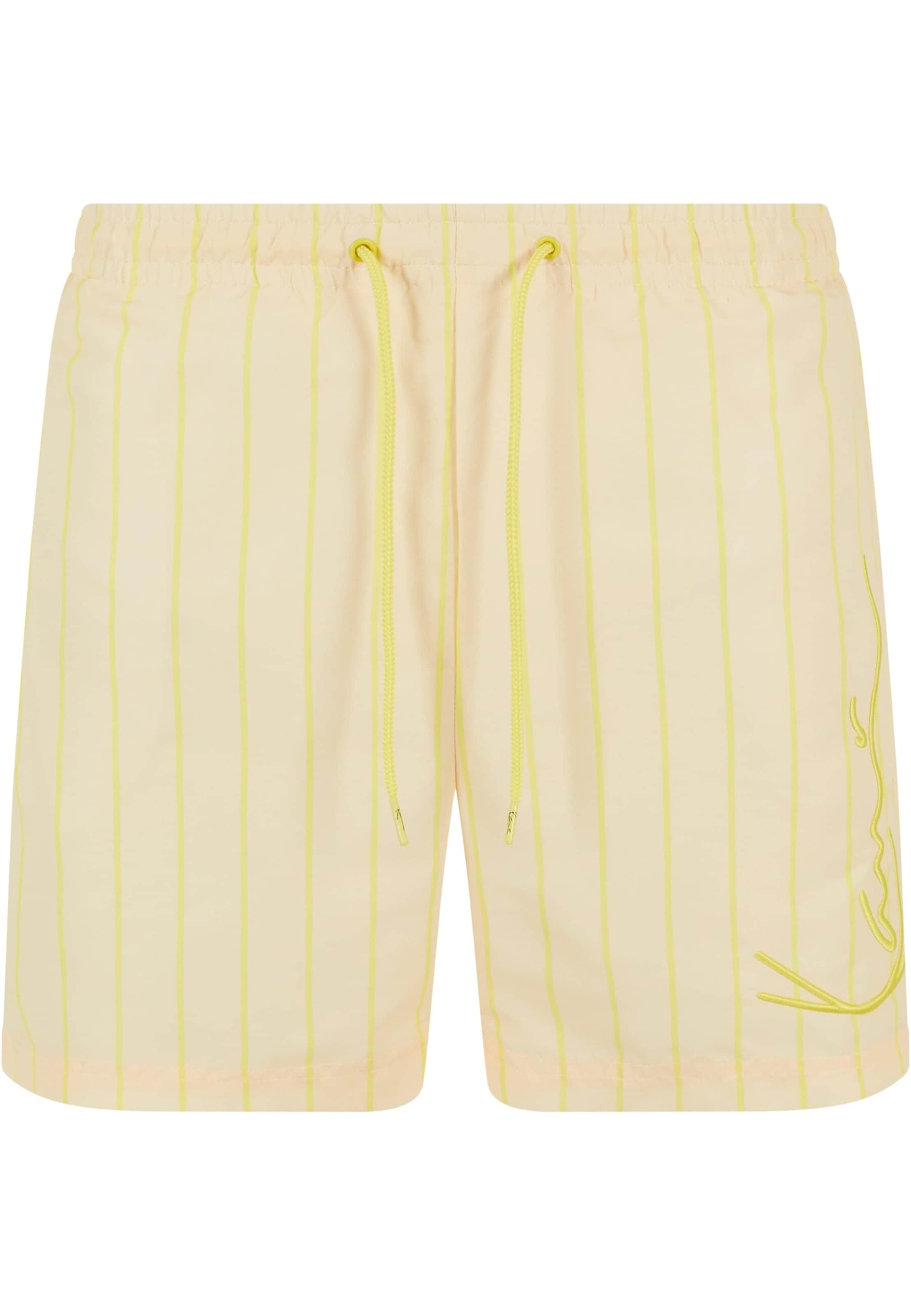 Shorts de bain Karl Kani en jaune : devant