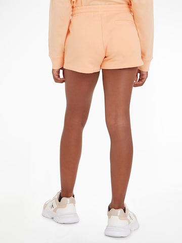 Calvin Klein Jeans Regular Pants 'Hero' in Orange