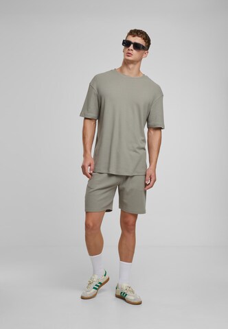 Urban Classics Свободный крой Штаны в Зеленый