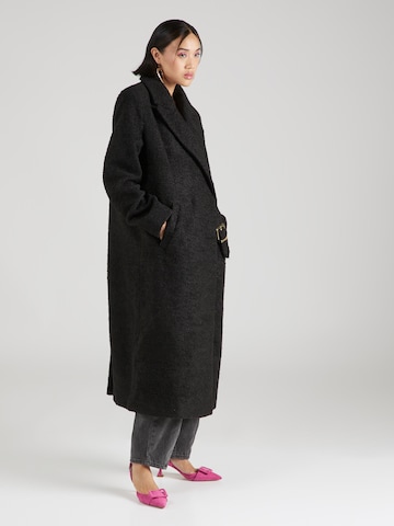 Hoermanseder x About You Ανοιξιάτικο και φθινοπωρινό παλτό 'Naomi' σε μαύρο: μπροστά