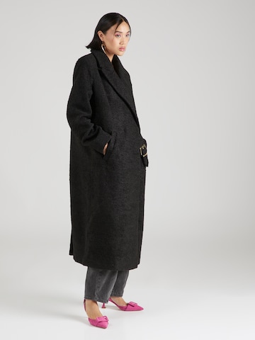 Hoermanseder x About You Between-seasons coat 'Naomi' in Black: front