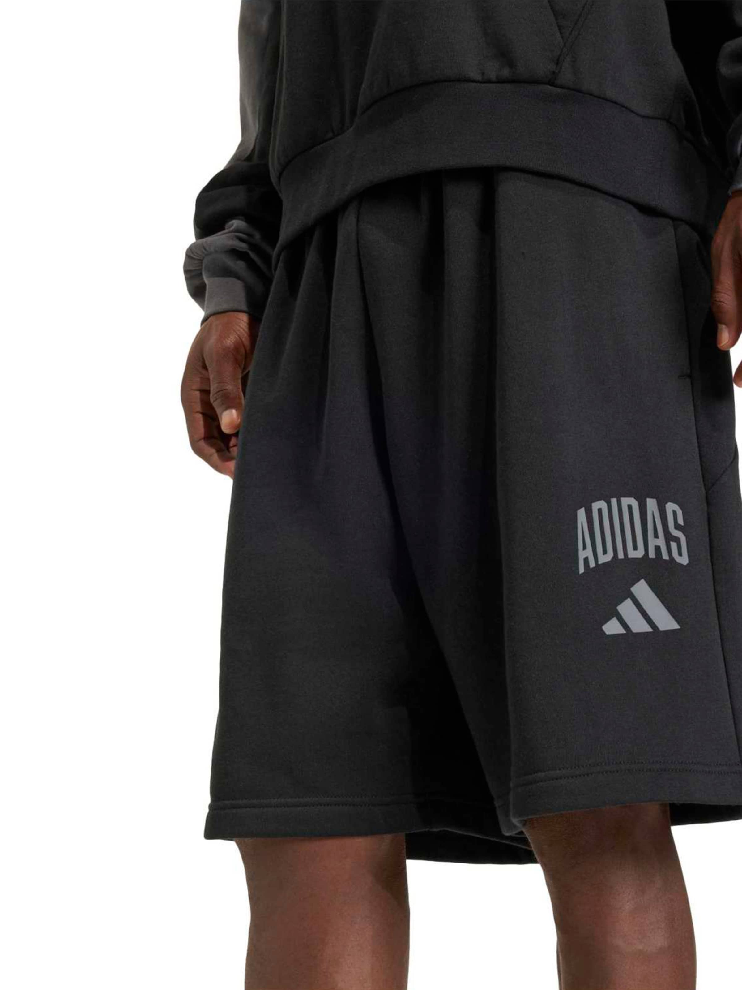 ADIDAS SPORTSWEAR Bő szár Sportnadrágok 'COLLEGIATE' - fekete