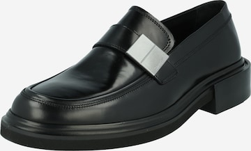 Calvin Klein Slip-ons in Black: front