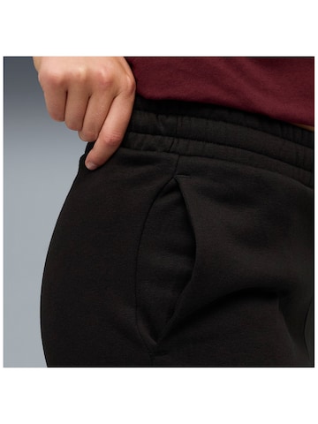 PUMA Regular Sporthose 'Puma Ess Metallic Sweatpants Fl'‌ in Schwarz