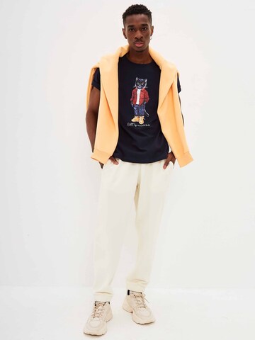 T-Shirt 'COUNTRY CAT' CAT by Maniita Lacitta en bleu