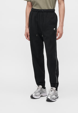 Effilé Pantalon 'Air' Nike Sportswear en noir : devant