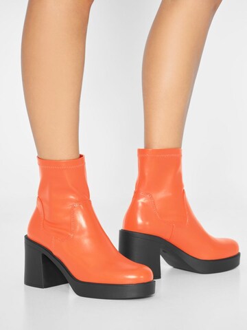 Bianco Ankle Boots in Orange